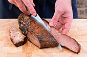 Cut cooked meat against the fibre