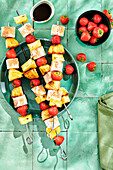 Fruit skewers with strawberries, pineapple and marshmallows