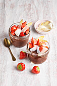 Chocolate cream with strawberries and asparagus