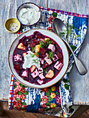 Red cabbage and beetroot borscht with tofu for vegetarians