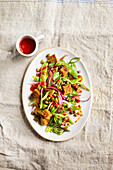 Bean and onion salad with curry croutons