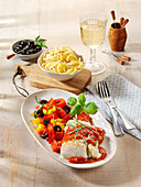 Cod fillets with bell pepper pan and olives
