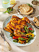Spicy bell pepper spatchcock chicken with laffa bread