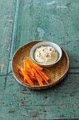 Carrot sticks with curry cream cheese dip
