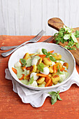 Fine carrot gnocchi with mini mozzarella