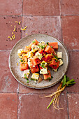 Indian watermelon salad with feta cheese and black cumin