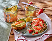 Quinoa salad with strawberries, pomelo and salmon and avocado terrine