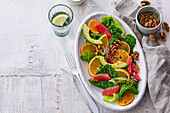 Citrus salad with kale and walnuts