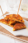 Chickpea and soya milk farinata with sautéed vegetables