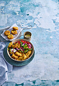 Falafel salad with cucumber, tomato and red onion