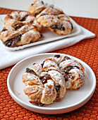 Sweet plait with sultanas and apricot compote