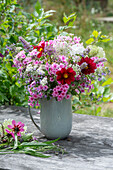 Summer bouquet with wild carrot, single-flowering dahlia, Phlox, yarrow, cranesbill, catmint, ornamental leek and anise hyssop