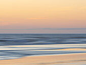 Abstract blur of sunset sea and beach.