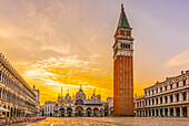 St. Marks Square, Venice, Italy. Wide angle view at sunrise of St. Mark's Campanile, the bell tower of St. Mark's Basilica in the famous square.