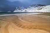 a long exposure to capture the afternoon light at Haukland beach during an winter day, Vestvagoy, Lofoten island, Norway, Europe