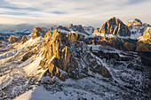Aerial view of Passo Giau at sunset during autumn with snow, Belluno, San Vito di Cadore, Ampezzo Dolomites, Veneto, Italy, Western Europe