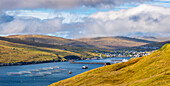 Panormaic and elevated view of Sandavagur village at sunset, Vagar, Faroe Islands, Denmark, Scandinavia