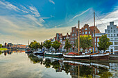 Lübeck, fishing and tourism boats moored on the river Trave. Lübeck, Land Schleswig-Holstein, Germany, Europe