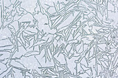 Painting on ice at Ampola lake, Trentino, Italy