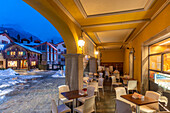 View of snow covered town centre on Via Roma in Courmayeur in winter, Courmayeur, Aosta Valley, Italian Alps, Italy