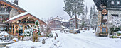 View of snow covered wooden houses in Entreves in winter, Entreves, Aosta Valley, Italian Alps, Italy