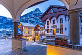 View of Piazza Abbe Henry from Church of Saint Pantalon at dusk, Courmayeur, Aosta Valley, Italian Alps, Italy
