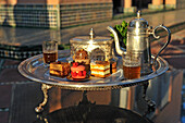 Pastries designed by Pierre Herme, made by Richard Bourlon, with mint tea, Pavillion Menzeh, garden of La Mamounia Hotel, Marrakesh, Morocco