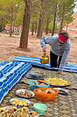 Lunch break, group of bikers, road from Telouet to Tighza, Ouarzazate Province, region of Draa-Tafilalet, Morocco