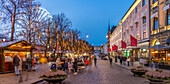 View of cafes, bars and architecture on Karl Johans Gate and Royal Palace at Christmas, Oslo, Norway, Scandinavia