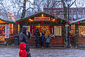 View of Christmas market during winter at dusk, Stortingsparken, Oslo, Norway, Scandinavia