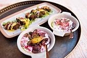 Dish in the restaurant of Dar Tantora The House Hotel, a renovated original mudbrick village in the oasis of AlUla, Medina Province, Saudi Arabia
