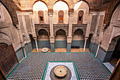 Beautiful interior and Islamic mosaic art, Al-Attarine Madrasa in the Medina of Fes, UNESCO, Morocco