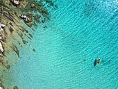 Diaporos island with wild beaches with turquoise water, drone top aerial view, Chalkidiki, Greece