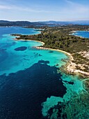 Diaporos island with wild beaches with turquoise water, drone aerial view, Chalkidiki, Greece