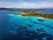 Diaporos island with wild beaches with turquoise water, drone aerial view, Chalkidiki, Greece