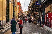 Busy street bazaar full of shops in Athens, Greece