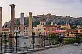 Hadrians Library, ancient Greek buildings with Parthenon and Acropolis on top of hill, Athens, Greece