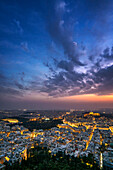 City at sunset with Parthenon and Acropolis seen from Lycabettus hill viewpoint, Athens, Greece