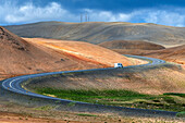 Motorhome in the Geothermal landscape with different colours, high temperature area Namaskaro or Namskard, Namafjall, Myvatn, Norourland eystra, Northeast