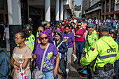 Nazarene of St. Paul. Caracas. On Holy Wednesday, hundreds of Venezuelan believers dressed in purple attend the Basilica of Santa Teresa in Caracas to venerate and pay their promises to the Nazarene of St. Paul. This Holy Week tradition dates back to the 16th century, in gratitude to San Pablo El Ermita?o for stopping the smallpox epidemic that plagued the city. Venezuela.