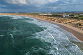Aerial view of kite surfing on Praia da Cova da Alfarroba/Praia do Baia in Peniche