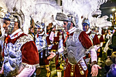Seville, Spain, Apr 2 2010, Members of Roman Centuria Macarena march during the Good Friday procession in Seville, showcasing traditional attire and solemnity.