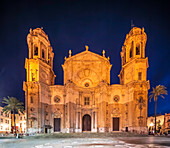 Majestic illuminated Cadiz Cathedral showcasing baroque and neoclassical architectural styles