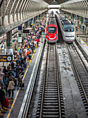 Seville, Spain, Apr 4 2025, A large number of travelers gather at Santa Justa Station in Seville, awaiting to board high-speed trains for their journeys.