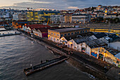 Aerial view of waterside Cais do Sodre and Titanic sur Mer at sunset, a buzzing nightlife and dining destination in Lisbon, Portugal