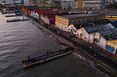 Aerial view of waterside Cais do Sodre and Titanic sur Mer at sunset, a buzzing nightlife and dining destination in Lisbon, Portugal