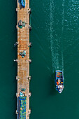 Aerial view of boat entering the Marina de Peniche sports port