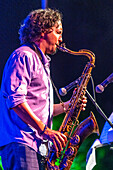 Seville, Spain, July 26 2022, Daniel Torres captivates the audience with his saxophone performance at a jazz concert in CAAC, Seville, Spain on a lively evening.