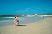 A serene long exposure view of Barbate Beach, showcasing sandy shores and vibrant scenery