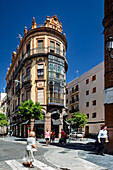 Seville, Spain, Aug 3 2012, Historic regionalist building by Antonio Arevalo in Seville's Arenal district showcases a unique architectural style.